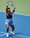 Taylor Townsend plays an overhead shot at the net during a tennis match — athletic focus and power, professional tennis photography by Zach Matthai.